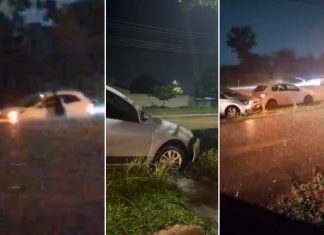 Carros ficam ilhados após chuva intensa alagar avenidas de Palmas