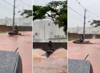Morador usa moto aquática em rua após chuva causar alagamentos em Araguaína; vídeo