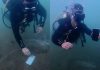 Mergulhadores fazem buscas por duas horas para resgatar celular que caiu no Lago de Palmas